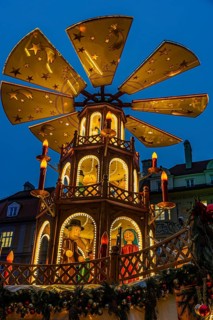 Christmas market with three-story illuminated Christmas pyramid, Rindermarkt, Munich, Upper