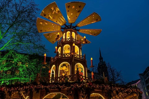 Christmas market with three-story illuminated Christmas pyramid, Rindermarkt, Munich, Upper