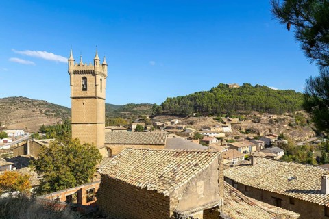 Church tower and rooftops of medieval village of Uncastillo, Cinco Villas, Zaragoza province,