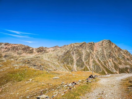 View of the high alpine mountain landscape at the Timmelsjoch rest house on the border between