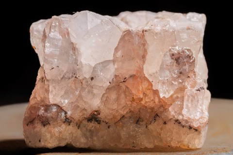 This clear quartz crystal is highlighted by its fascinating structure. Details of its surface