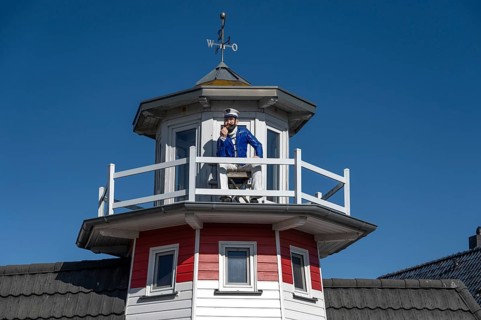 Captain figure on the balcony of a holiday home, Zingst, Darß, Mecklenburg-Western Pomerania,