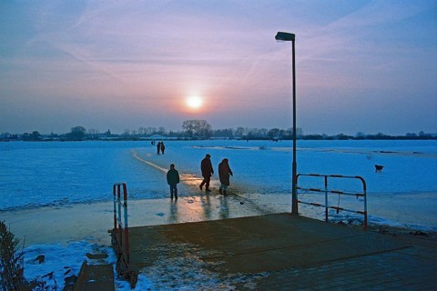 People walk across frozen Elbe, ferry dock, Neu Bleckede, Bleckede, Lower Saxony, Germany, February