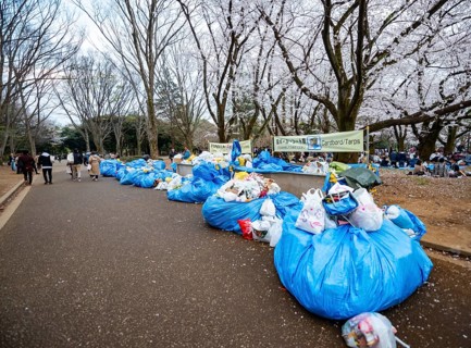 Large piles of trash at a garbage collection point, garbage bags, Yoyogi Park, Hanami Festival,