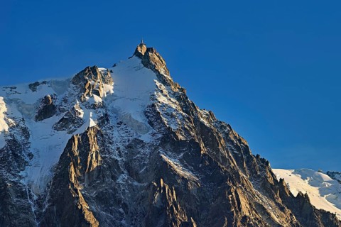 Snowy Aiguille du Midi in the evening light, Mont-Blanc, Chamonix-Mont-Blanc, Haute-Savoie, France