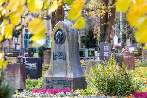 Honorary grave of poet Eduard Mörike. Pragfriedhof Stuttgart in autumn. November is traditionally a