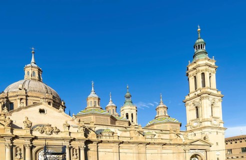 Towers and domes on roof of Basilica of Our Lady of the Pillar cathedral church, Zaragoza, Aragon,