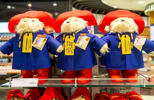 Paddington Bear toys on display, shopping area in departures lounge area, Terminal 5, London