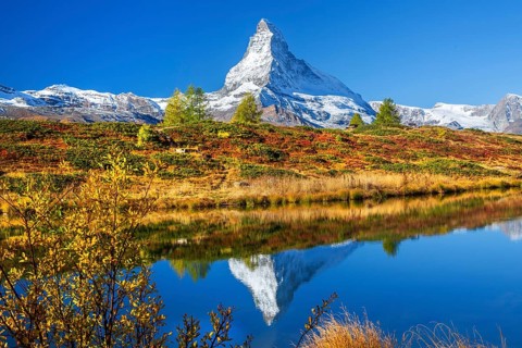 Matterhorn 4478 m with reflection in Leisee on the Sunnegga in autumn, Zermatt, Mattertal, Valais,