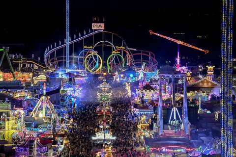 View of Oktoberfest from St. Paul's Catholic Church, Blue Hour, Munich, Bavaria, Germany