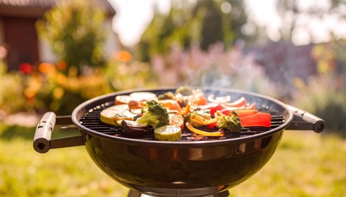 Cooking vegetables on grill outdoors, healthy lifestyle with healthy food, close up of grill with