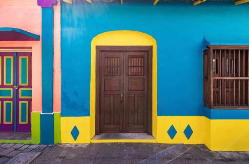 Colorful colonial architecture of historic center of Flores, Guatemala