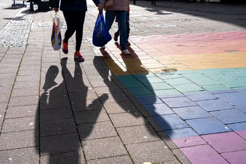 Shadows of passers-by shopping in the city center, Essen, North Rhine-Westphalia