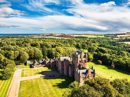 Ayton Castle from a drone, Ayton, Eyemouth, Scottish Borders, Scotland, UK