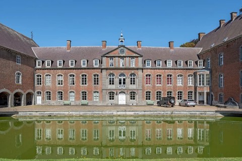 16th century Classicist Château de Franc-Waret in Louis XV style, moated castle in the village