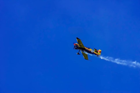 A Votec 351 sport aircraft from the Swiss MSW Aviation AG with registration HB-YMV during a flight