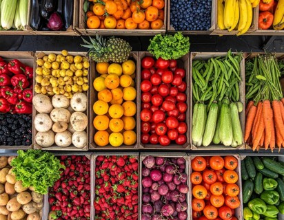 Fresh fruits and vegetables in a market display, aerial view perpendicular top down, healthy eating