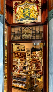 The Posthumus Shop, stationery boutique, shop façade with decorative stamp motifs, St. Luciensteeg,