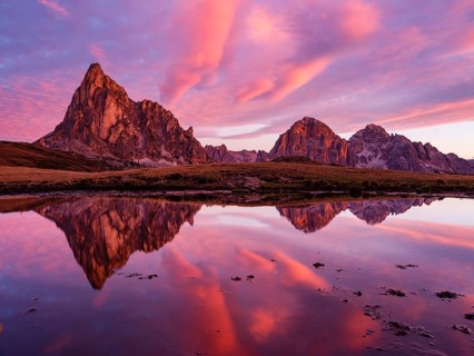 Alpine glow, reflection of the Ra Gusela and Tofane mountains at dawn, Passo di Giau, Giau Pass,