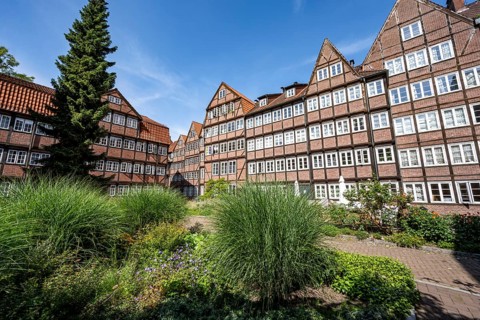 Facades of the historic brick buildings, inner courtyard, view over the city, Peterstraße,
