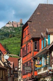 Historic town view with St Ulrich's Castle and half-timbered houses in Ribeauvillè