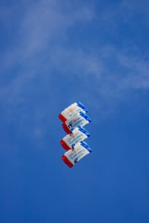 Parachutists during an aerial acrobatic demonstration as part of an air show on the Rossfeld in