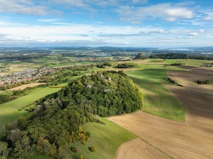 Aerial view of the Hegau volcano and the Mägdeberg castle ruins, with the Hohenkrähen and Lake