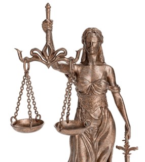 Bronze lady of justice statue isolated on a white background