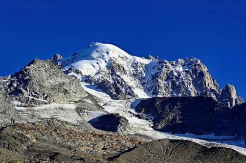 Aiguille des Grands Montets and snow-covered Aiguille Verte, Chamonix-Mont-Blanc, Haute-Savoie,