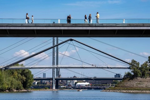 Bridges in Düsseldorf, in the foreground, the pedestrian and cycle bridge over the canal to the