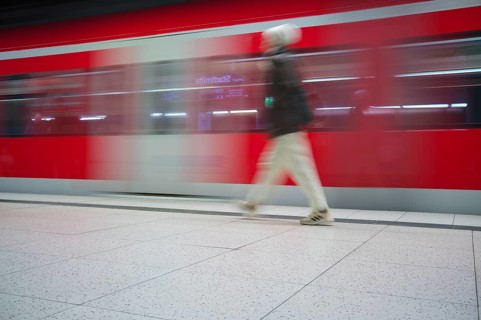 Underground arriving S-Bahn, train, class 420 in traffic red, platform, stop, Stadtmitte station,