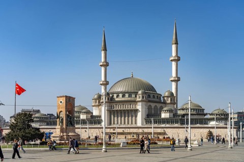 The Cumhuriyet Aniti Republic Monument and the Taksim Mosque on Taksim Square Taksim Meydani in