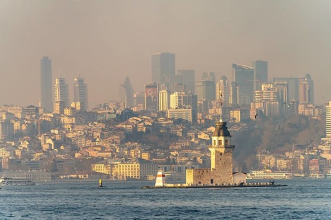 The Maiden Tower lighthouse, Leander Tower or Maiden Tower in front of the skyline of Istanbul,