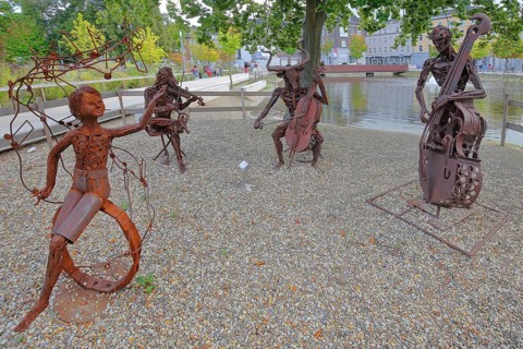 Sculpture The Concert by Günther Fahrner, rusty, metal sculpture, sheet metal, modern art, four