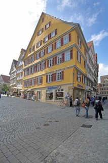 Yellow half-timbered house built in the 16th century, pedestrian, Holzmarkt, Tübingen, Neckar