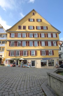 Yellow half-timbered house built in the 16th century, Holzmarkt, Tübingen, Neckar Valley,