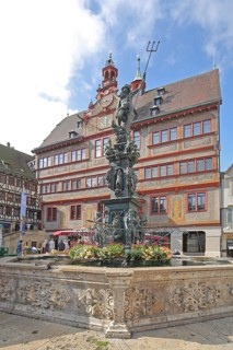 Neptune Fountain with sculpture of Neptune Roman god of the sea with trident, Renaissance Town