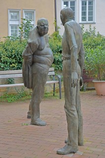 Sculpture Confrontation by Karl-Henning Seemann 1979, two bronze sculptures, modern art, male