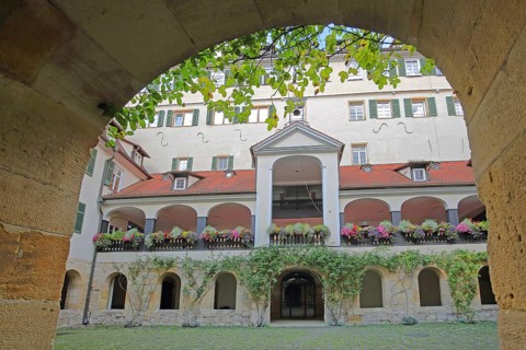 Protestant monastery built in 1534, inner courtyard with arcade and floral decoration, archway,