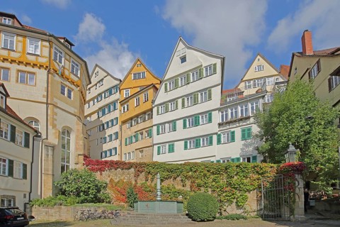 View from the inner courtyard of the Protestant monastery to houses with shutters in the