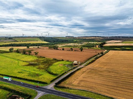 Wind Farm over fields and moors in Nord England
