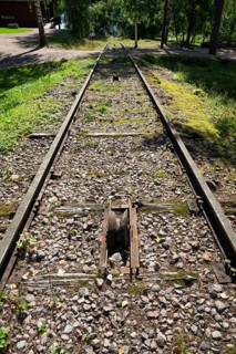 Railway line leads to Lake Väha Kamponen, former paper mill for the production of groundwood pulp