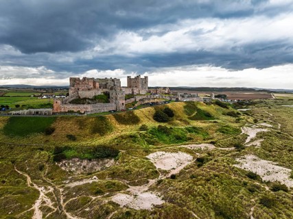 Bamburgh Castle from a drone, Northumberland, Northeast Coast, England, United Kingdom
