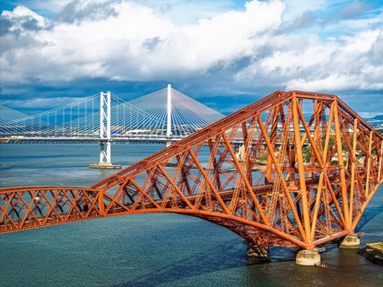 Forth Bridge from a drone, Queensferry Crossing, Forth Estuary, Scotland, United Kingdom