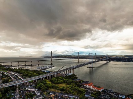 Rain clouds over Forth Road Bridge and The Queensferry Crossing from a drone, Queensferry Crossing,