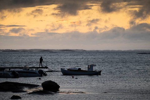 Small bay, archipelago, jetty with angler, Resö Island, Bohuslän, Skagerrak, Sotenäs, Västra