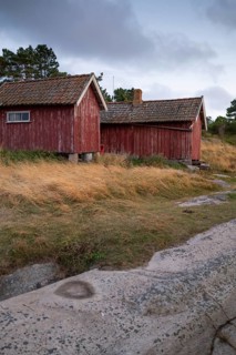Falun red or Swedish red boathouses by the sea, Resö Island, Bohuslän, Skagerrak, Sotenäs, Västra