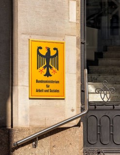 Yellow information signs, federal eagle with reference to federal ministries located there in the