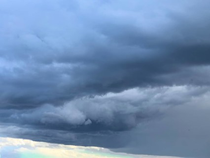 Gathering low pressure area with rain front dark stratus clouds Nimbostratus clouds, international