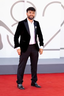 Venice, Italy - 3 September 2025: Amine Bouhafa wears a sticker in the colours of the Palestine